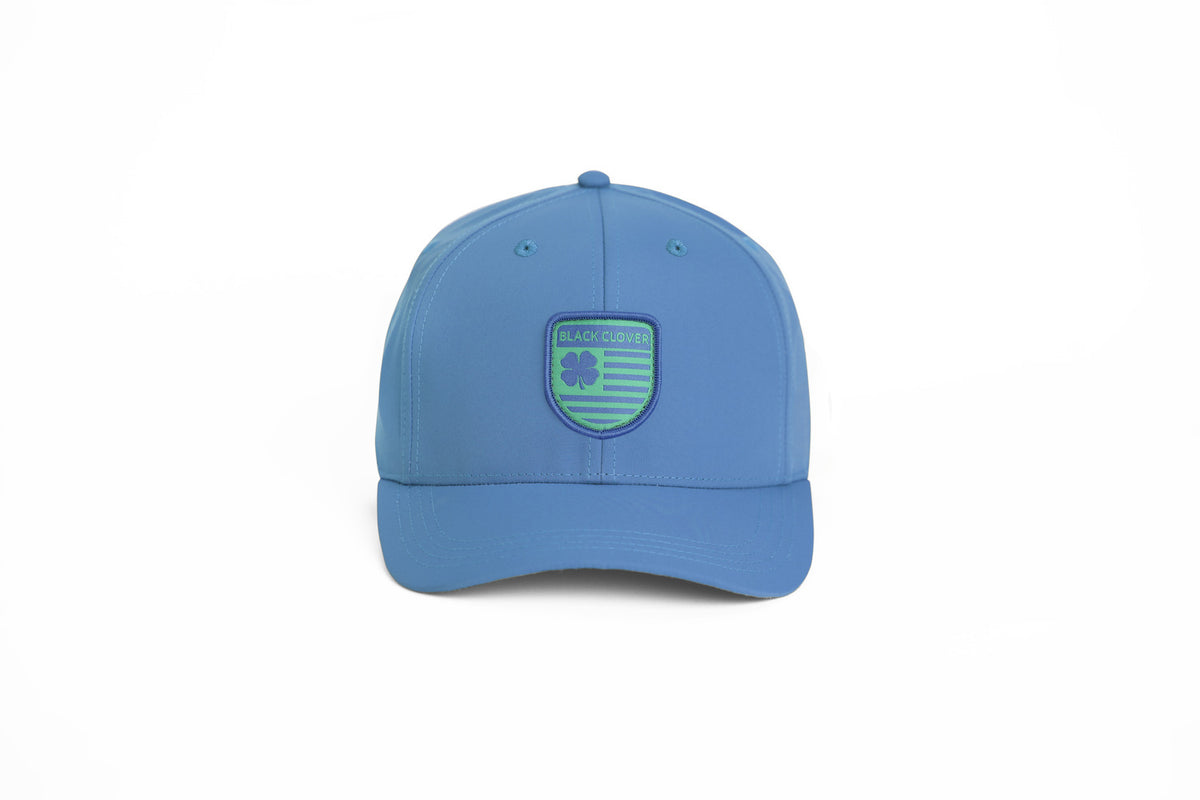 Black Clover UAE Nation 6 royal blue and kelly green adjustable cap, front view
